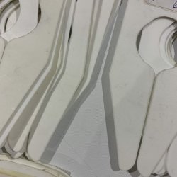 Aflang konfektionsskilt. 7 X 16 cm. 4 cm.